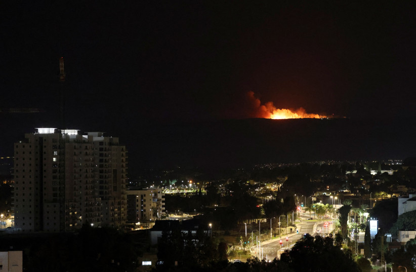  A view shows smoke and fire in Lebanon, near the border with Israel, as seen from Nahariya in northern Israel, October 31, 2023. (credit: REUTERS/VIOLETA SANTOS MOURA)