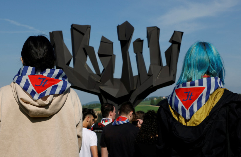  People participate in a commemoration of the liberation of the former concentration camp KZ Mauthausen, at the memorial site in Mauthausen, Austria, May 7, 2023 (credit: REUTERS/LEONHARD FOEGER)