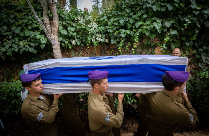 Family and friends of Israeli soldier Lavi Lipshitz mourn at his funeral at the Mount Herzl Military Cemetery in Jerusalem on November 1, 2023, Lipshitz was killed during a ground operation in the Gaza Strip. (credit: YONATAN SINDEL/FLASH90)