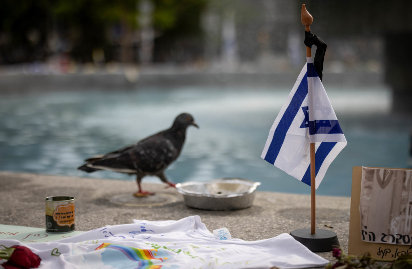 Flags, candles, flowers in memory of the more than 1500 slaughtered when hamas infiltrated Israel on Oct 7, and 239 Israelis taken hostage by Hamas terrorists into Gaza, on Dizengoff Square. October 29, 2023.