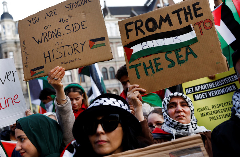  People take part in a demonstration in support of Palestinians, in Amsterdam, Netherlands October 15, 2023. (credit: PIROSCHKA VAN DE WOUW/REUTERS)