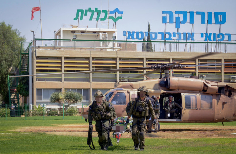 Wounded people from the rockslide scene in Ein Gedi nature reserve, arrive to the Soroka Medical Center in Be'er Sheva, southern Israel, August 24, 2023 (credit: FLASH90)