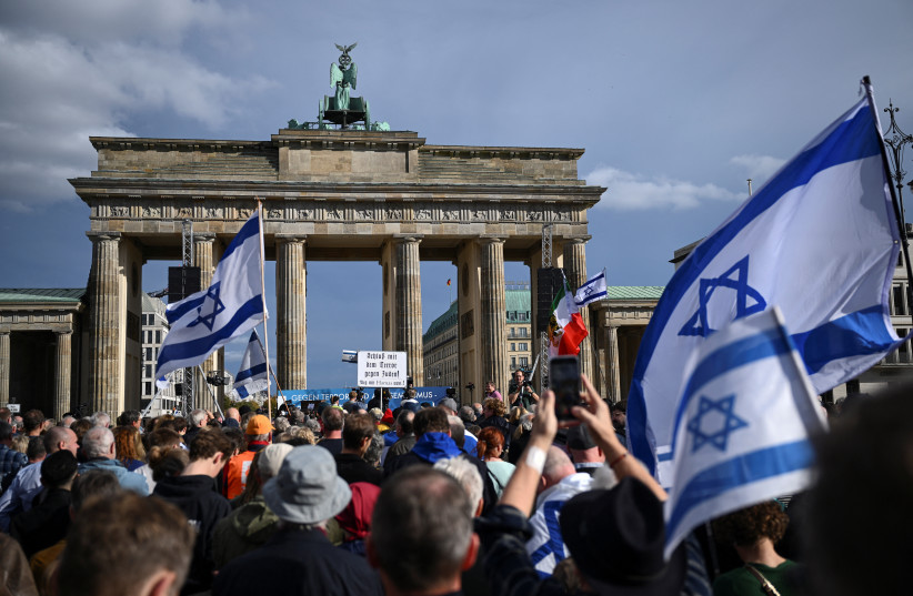  People attend the rally ''Against terror and antisemitism! Solidarity with Israel'' organised by Germany's Central Council of Jews, political parties, unions and civil society, at Brandenburg Gate, amid the ongoing conflict between Israel and the Palestinian Islamist group Hamas, in Berlin, Germany. (credit: REUTERS/ANNEGRET HILSE)