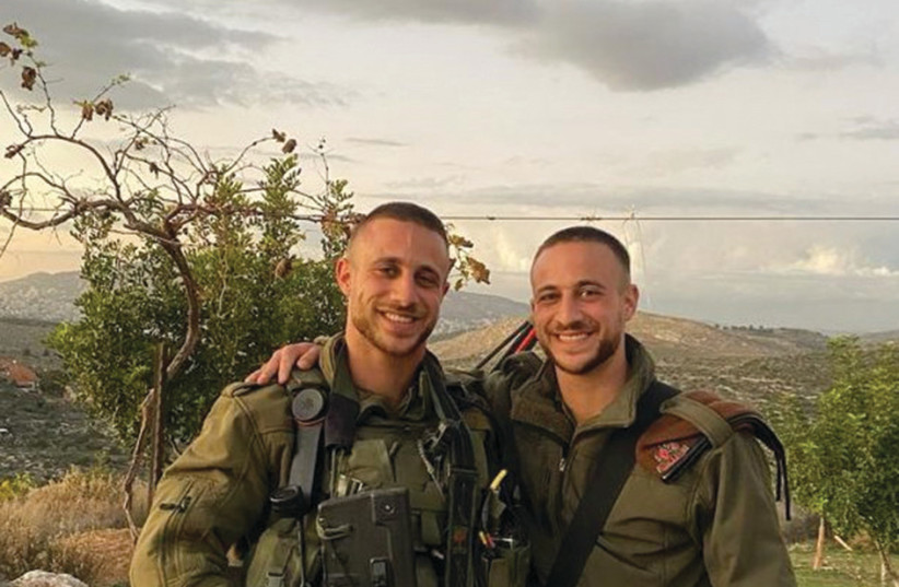  DUO IN uniform: Twins Yishai (L) and Yonatan. (credit: Photos: Courtesy Slotki family)