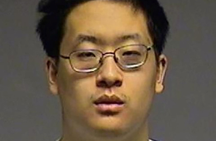 Cornell University student Patrick Dai, who was charged by federal prosecutors for allegedly making online threats against Jewish students at the Ivy League school, appears in a police booking photo in Binghamton, New York, U.S. October 31, 2023. (credit:  Broome County Sheriff's Office/Handout via REUTERS)