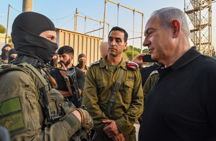  Prime Minister Benjamin Netanyahu meets Israeli forces at the Mitkan Adam army base on November 2, 2023 (credit: KOBI GIDEON/GPO)