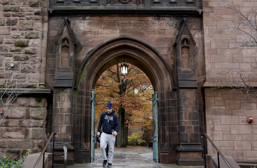  A student walks on the campus of Yale University in New Haven, Connecticut November 12, 2015. (credit: REUTERS/SHANNON STAPLETON)