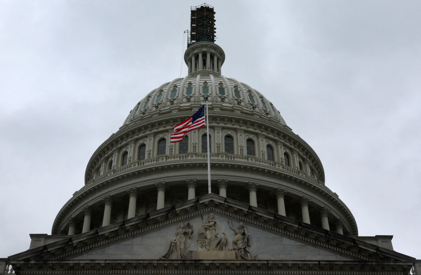   The dome of the U.S. Capitol building is seen on a rainy day, September 23, 2023. (credit: REUTERS/LEAH MILLIS)