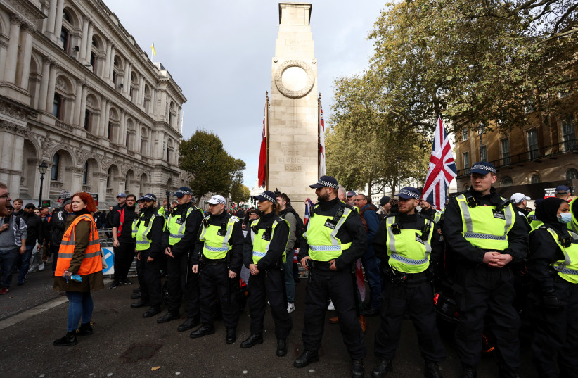  Police officers guard 'The Cenotaph' on the day of a protest in solidarity with Palestinians in Gaza, amid the ongoing conflict between Israel and the Palestinian Islamist group Hamas, in London, Britain, October 28, 2023. (credit: REUTERS/Susannah Ireland)