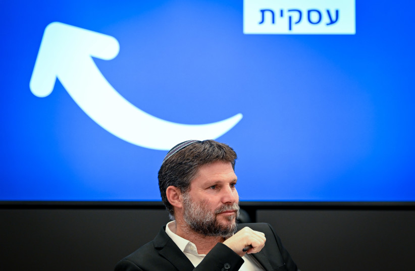  Bezalel Smotrich attends a press conference at the Finance Ministry in Jerusalem on October 15, 2023. (credit: Arie Leib Abrams/Flash90)
