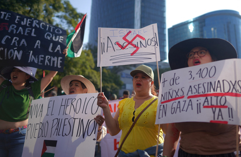 People shout slogans during a march in support of Palestinians in Gaza, calling for a ceasefire and that Mexico cut ties with Israel, in Mexico City, Mexico, November 5, 2023.