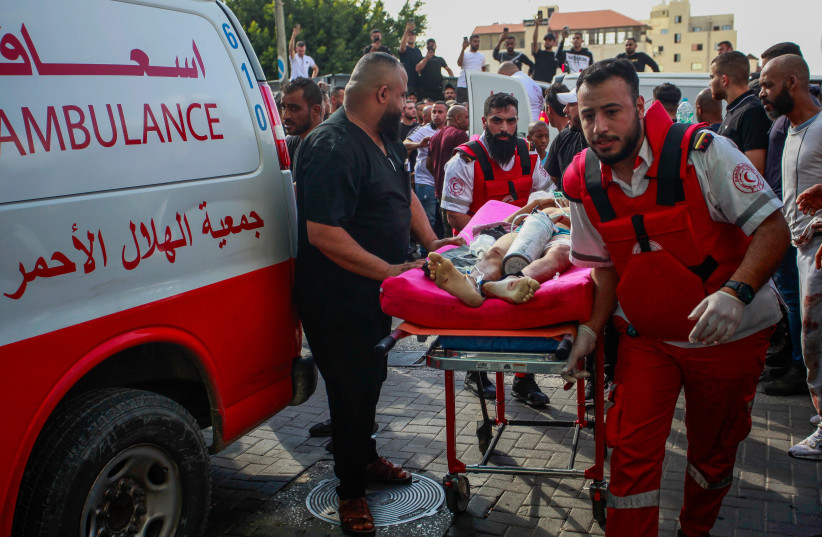  Wounded Palestinians arrive at the hospital after being injured from an Israeli airstrike, in the West Bank city of Tulkarm, in the West Bank on October 19, 2023. (credit: NASSER ISHTAYEH/FLASH90)