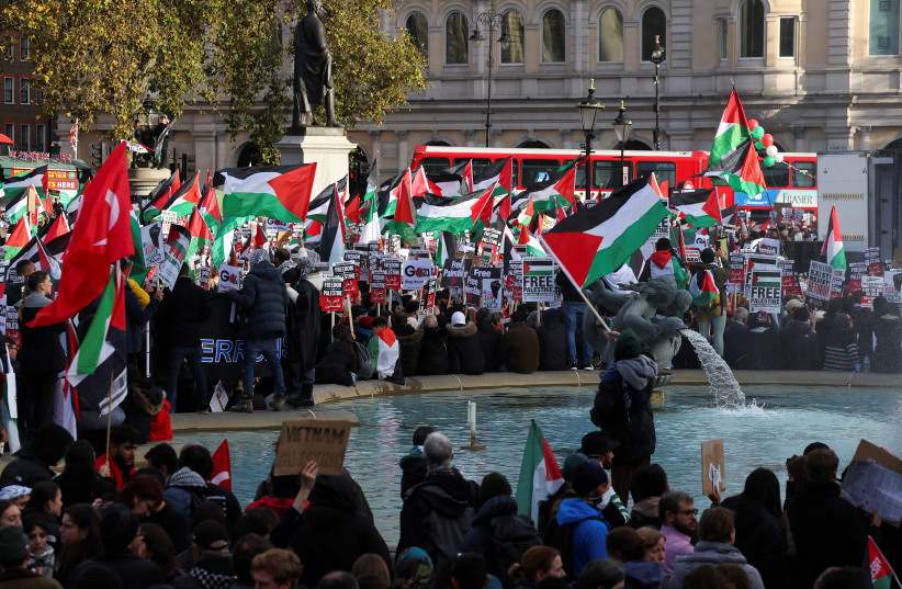  Demonstrators gather at Trafalgar Square as they protest in solidarity with Palestinians in Gaza, amid the ongoing conflict between Israel and the Palestinian Islamist group Hamas, in London, Britain, November 4, 2023. (credit: REUTERS/TOBY MELVILLE)