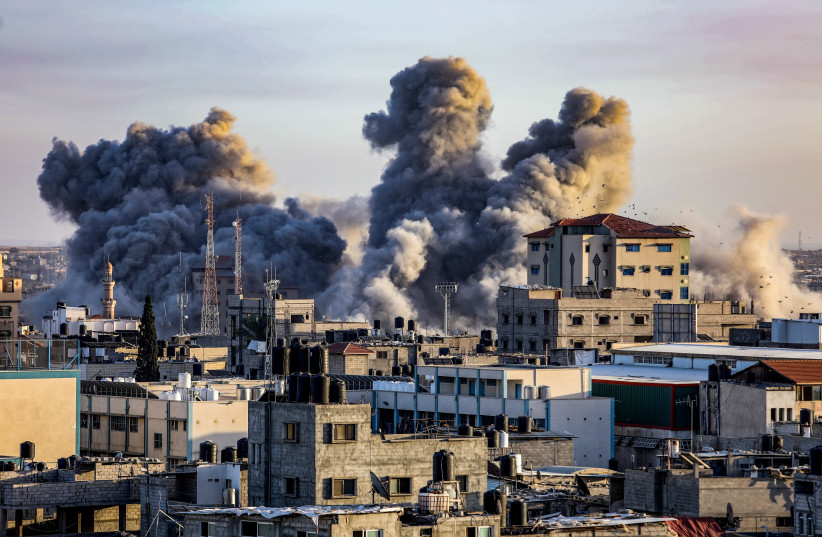  Smoke rises after Israeli air strikes as it seen from Rafah, in the southern Gaza Strip, November 6, 2023. (credit: ABED RAHIM KHATIB/FLASH90)
