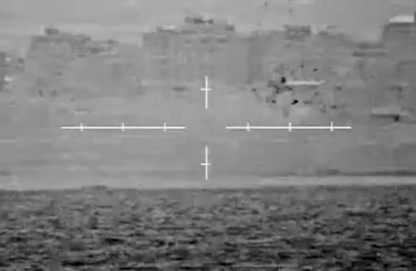  Israeli Navy hits a target in Gaza, during the Israeli-Palestinian conflict, from an unspecified location on the sea October 14, 2023 in this still image from handout video. (credit: IDF/Handout via REUTERS)