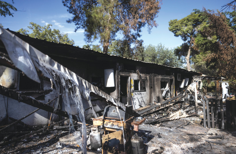 The destruction caused by Hamas terrorists in Kibbutz Nir Oz on October 7. Yonadav Levenstein fought there fearlessly, saving many from unspeakable fates, says the writer. (credit: Chaim Goldberg/Flash90)