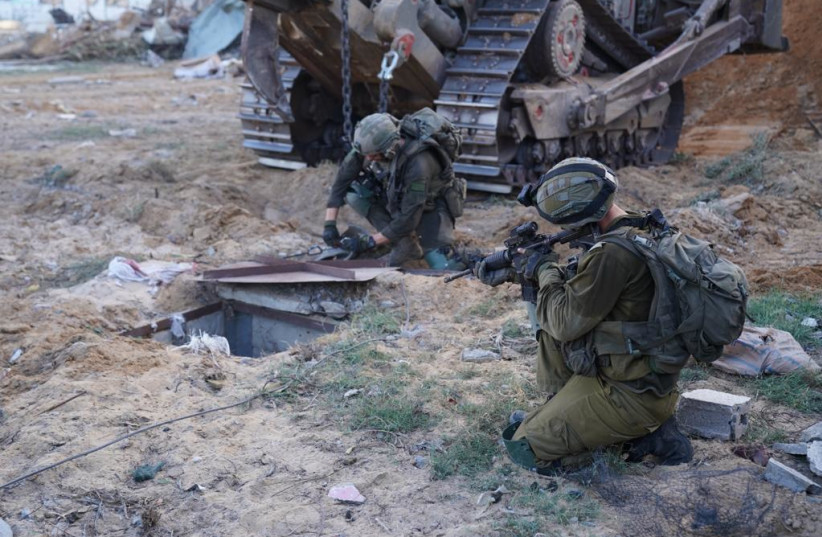  IDF soldiers find a tunnel near a Hamas outpost in northern Gaza. (credit: IDF SPOKESPERSON'S UNIT)