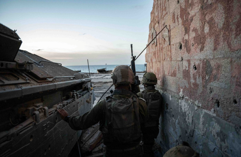 Israeli forces are seen during Operation Swords of Iron in the Gaza Strip, November 13, 2023 (credit: IDF SPOKESPERSON'S UNIT)