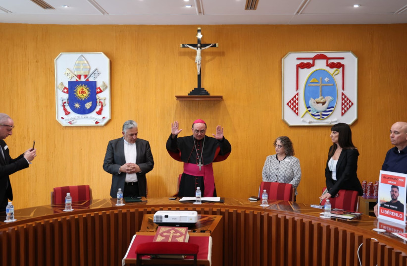Deputy Cardinal of Mexico, Bishop Salvador González Morales prays for the release of the hostages in Gaza. (credit: Israeli Embassy in Mexico)