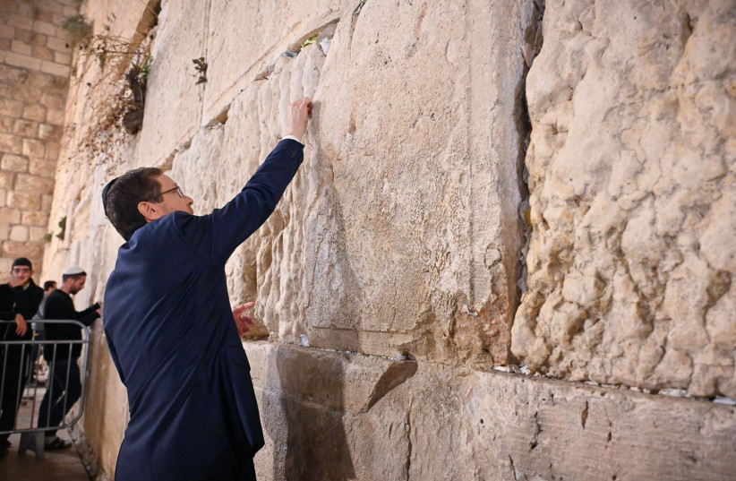 President Isaac Herzog at the Western Wall in Jerusalem. November 14, 2023. (credit: KOBI GIDEON/GPO)