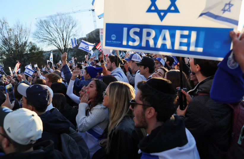 Israeli Americans and supporters of Israel gather in solidarity with Israel and protest against antisemitism, amid the ongoing conflict between Israel and Hamas, during a rally on the National Mall in Washington, U.S, November 14, 2023. (credit: REUTERS/LEAH MILLIS)
