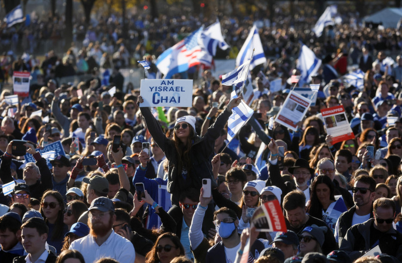  Israeli Americans and supporters of Israel gather in solidarity with Israel and protest against antisemitism, amid the ongoing conflict between Israel and the Palestinian group Hamas, during a rally on the National Mall in Washington, U.S, November 14, 2023. (credit: REUTERS/LEAH MILLIS)