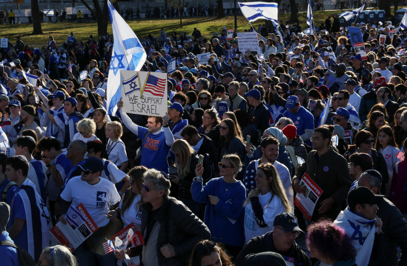  Israeli Americans and supporters of Israel gather in solidarity with Israel and protest against antisemitism, amid the ongoing conflict between Israel and the Palestinian group Hamas, during a rally on the National Mall in Washington, U.S, November 14, 2023. (credit: REUTERS/LEAH MILLIS)