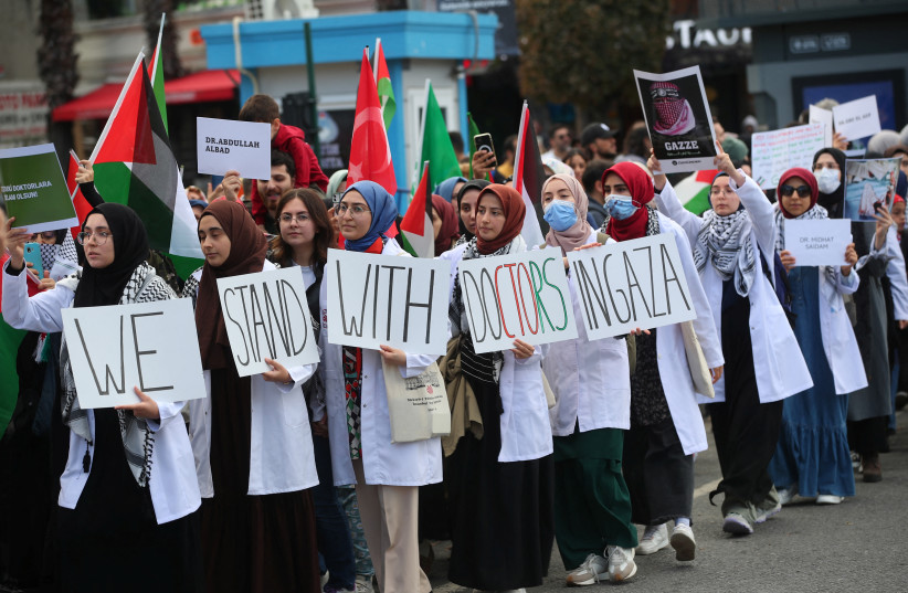 Protesters march in support of Palestinians in Gaza, amid the ongoing conflict between Israel and the Palestinian Islamist group Hamas, in Istanbul, Turkey, November 12, 2023.