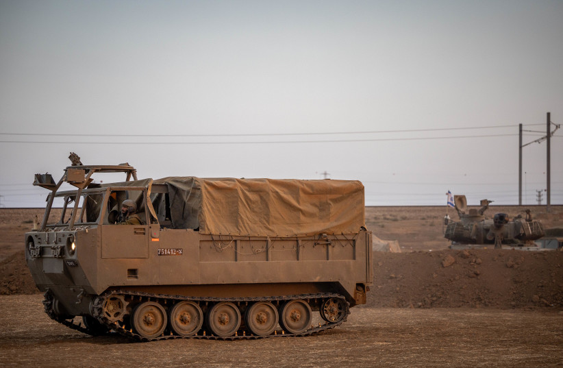 Israeli reserve soldiers seen at their artillery unit stationed near the Israeli-Gaza border, in southern Israel, November 13, 2023.