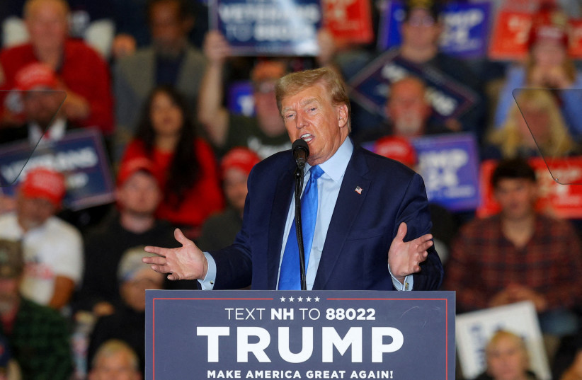  Republican presidential candidate and former U.S. President Donald Trump speaks during a campaign rally in Claremont, New Hampshire, U.S., November 11, 2023. (credit: REUTERS/BRIAN SNYDER)