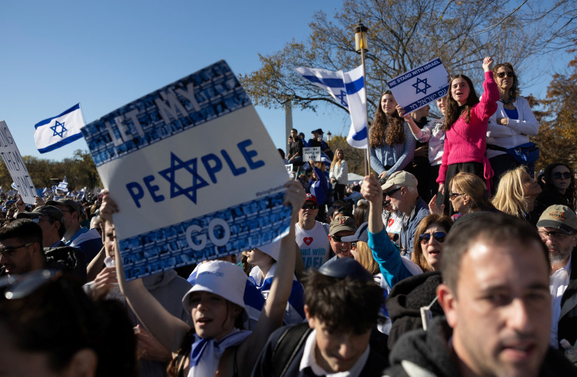  Israeli Americans and supporters of Israel gather in solidarity with Israel and protest against antisemitism, amid the ongoing conflict between Israel and the Palestinian group Hamas, during a rally on the National Mall in Washington, U.S, November 14, 2023.  (credit: REUTERS/TOM BRENNER)