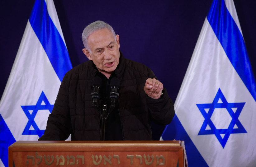  Benjamin Netanyahu, Yoav Galant, and Benny Gantz hold a joint press conference at the Defense Ministry, in Tel Aviv on November 11, 2023.  (credit: MARC ISRAEL SELLEM/POOL)