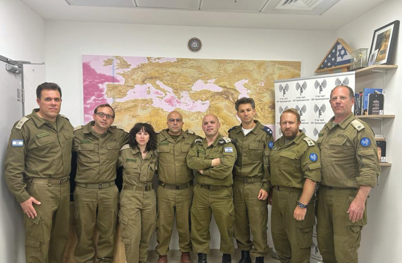 IDF TEAM of olim disseminating information across the world: (L to R) Lt.-Col. Jonathan Conricus; Maj. Roni Caplan; Maj. Libby Weiss; Maj. Arieh; Lt.-Col. Richard Hecht; Lt.-Col. Amnon Shefler; Lt.-Col. Peter Lerner; Maj. Doron Spielman.