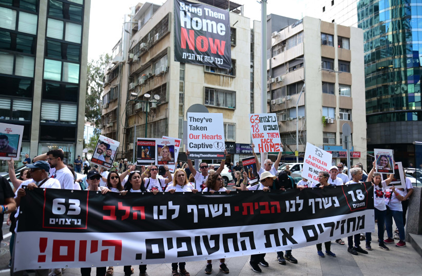  Israeli residents from kibbutz Kfar Aza, demonstrate outside the European Union embassy in Ramat Gan,  as part of a protest for the release of the Israelis held kidnapped by Hamas terrorists in Gaza on November 16, 2023. (credit: TOMER NEUBERG/FLASH90)
