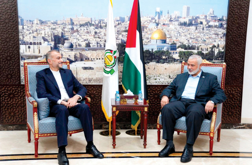 Iran’s Foreign Minister Hossein Amir Abdollahian meets Hamas political leader Ismail Haniyeh in Doha, Qatar, on October 14.  (credit: WANA/REUTERS)