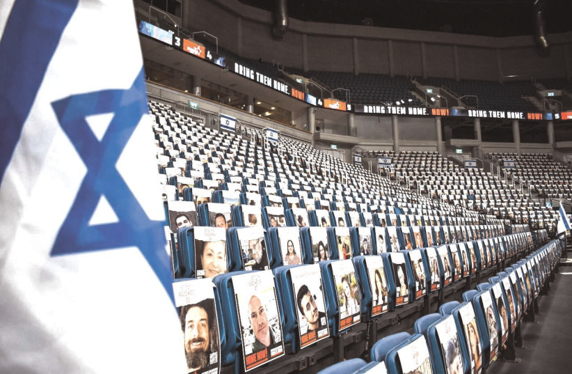  HAPOEL JERUSALEM’S Pais Arena in the capital had pictures of the hostages taken by Hamas on all the lower-bowl seats for Wednesday’s viewing event for their families. (credit: YEHUDA HALICKMAN)