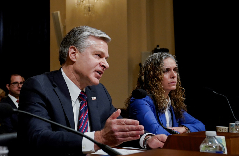 FBI Director Christopher Wray speaks next to National Counterterrorism Center Director Christine Abizaid during a House Homeland Security Committee hearing examining worldwide threats to the US, on Capitol Hill in Washington, US, November 15, 2023. (credit: REUTERS/ELIZABETH FRANTZ)