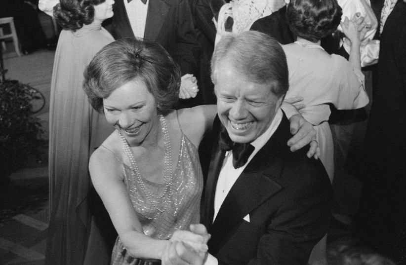 US President Jimmy Carter and first lady Rosalynn Carter dance at a White House Congressional Ball in Washington, December 13, 1978. (credit: Library of Congress/Marion S. Trikosko/Handout via REUTERS)