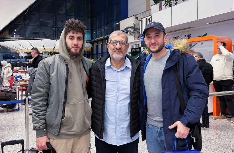  Palestinian doctor Jamal Mosleh is welcomed by his sons Halid and Salahudin at the Sarajevo airport after having been evacuated from Gaza, in Sarajevo, Bosnia and Herzegovina, November 20,2023. (credit: REUTERS/Daria Sucic Sito)