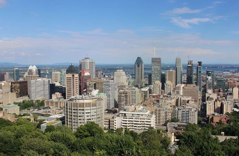  Downtown Montreal as seen from Mount Royal. (credit: PUBLIC DOMAIN)