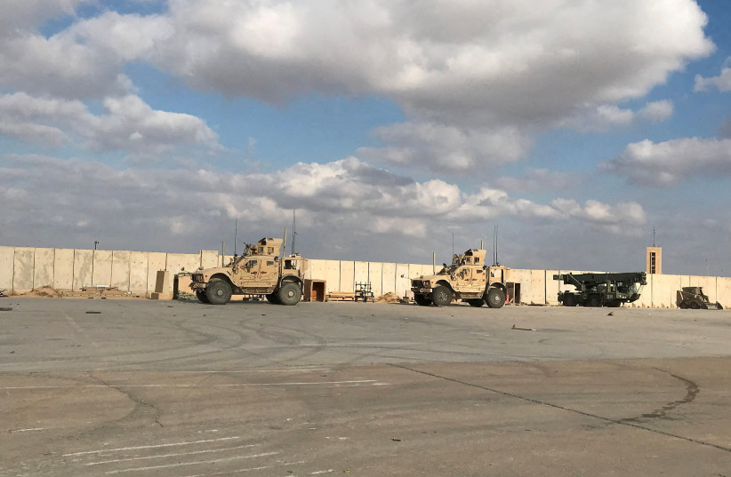  Military vehicles of US soldiers are seen at the al-Asad air base in Anbar province, Iraq, January 13, 2020. (credit: REUTERS/JOHN DAVISON)