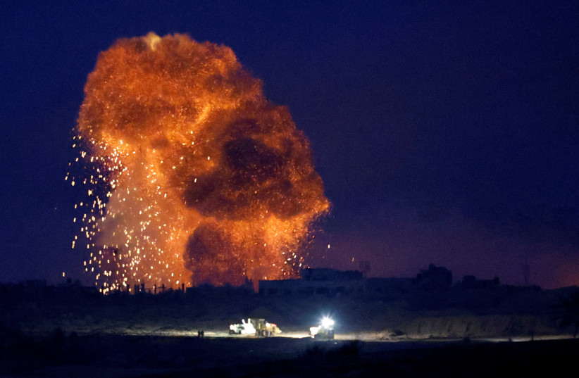  An explosion takes place during Israeli airstrikes over Gaza, as seen from southern Israel, amid the ongoing conflict between Israel and the Palestinian group Hamas, November 22, 2023. (credit: REUTERS/ALEXANDER ERMOCHENKO)