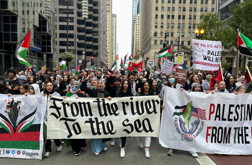  Palestinian-Americans and their supporters march as the conflict between Israel and Hamas continues, in downtown Chicago, U.S., October 8, 2023 (credit: REUTERS/ERIC COX)