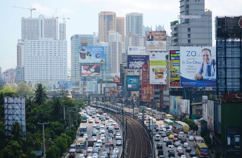  NEWSFLASH, CNN: The most densely populated city is faraway Manila.  (credit: Dondi Tawatao/Getty Images)