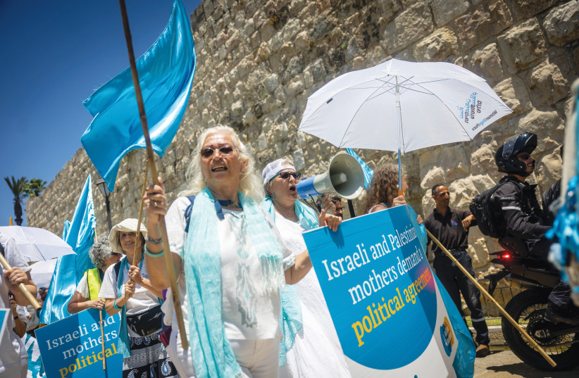  WOMEN WAGE Peace members protest near Jerusalem’s Old City, 2022. (credit: FLASH90)