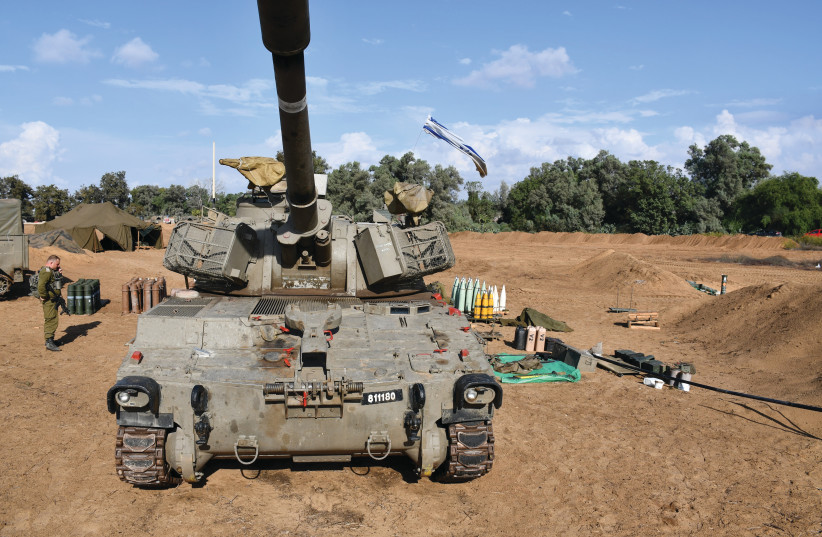  M109 HOWITZERS at a location near Gaza where the IDF Artillery Unit is supporting the troops in the battle against Hamas.  (credit: SETH J. FRANTZMAN)