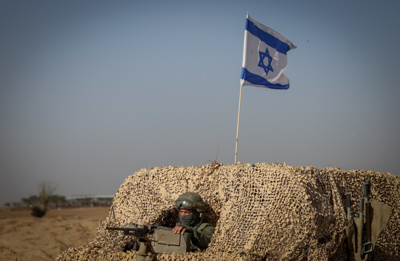  Israeli soldiers patrol near the Israeli-Gaza border, southern Israel, November 23, 2023 (credit: Chaim Goldberg/Flash90)