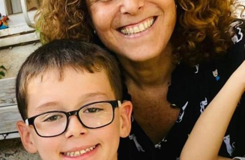  Ohad Munder seen with his mother, Karen, in an undated photo (credit: Hostage and Missing Families Forum)