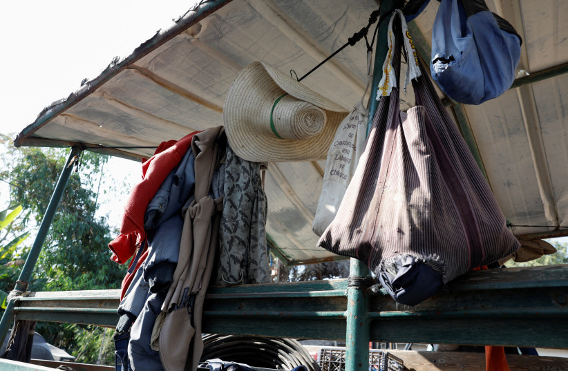  The clothes of Thai workers, many of who were killed or kidnapped, hang outside a destroyed home, following the deadly Oct. 7 attack by Hamas terrorists from the Gaza Strip, in Kibbutz Kissufim, southern Israel November 1, 2023.  (credit: REUTERS/EVELYN HOCKSTEIN)