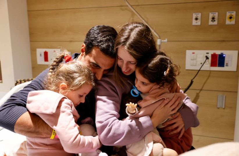  Aviv Asher, 2.5 years old, her sister Raz Asher, 4.5 years old, and mother Doron, returned to Israel last night to the designated complex at the Schneider Children's Medical Center after being held hostage by Hamas. (credit: Schneider Children's Medical Center Spokesperson)